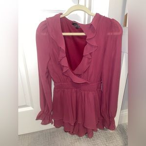 Never worn. Pink sheer long sleeve dress